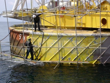 Diver inspecting CALM buoy hull