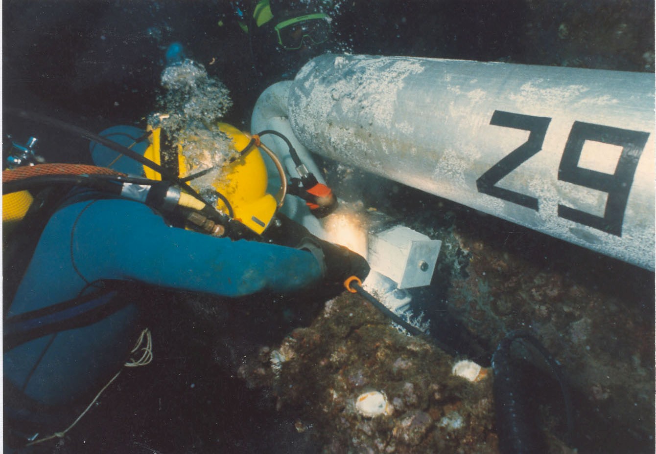 Diver installing anodes